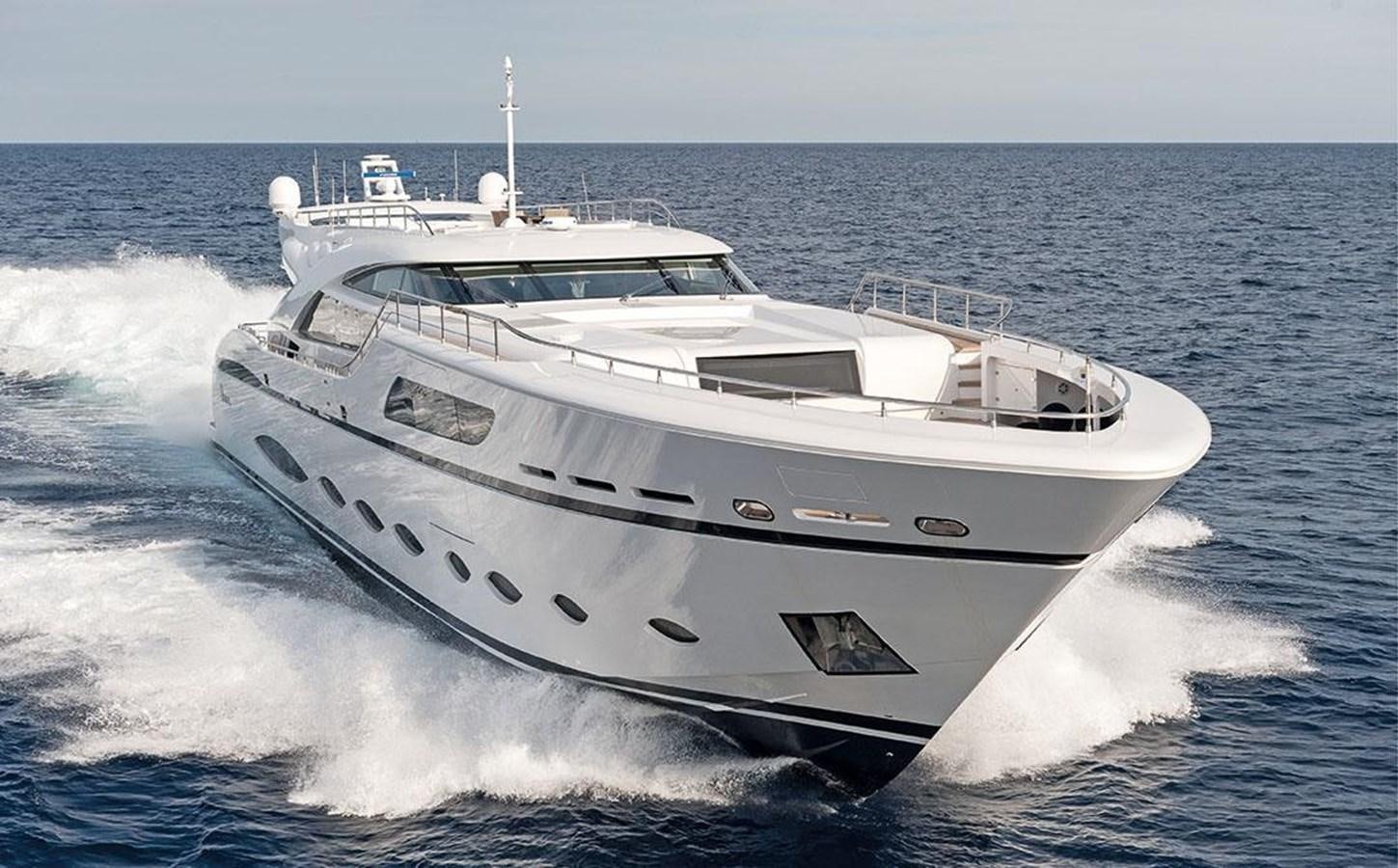 a white yacht on the water aboard FAST & FURIOUS Yacht for Sale