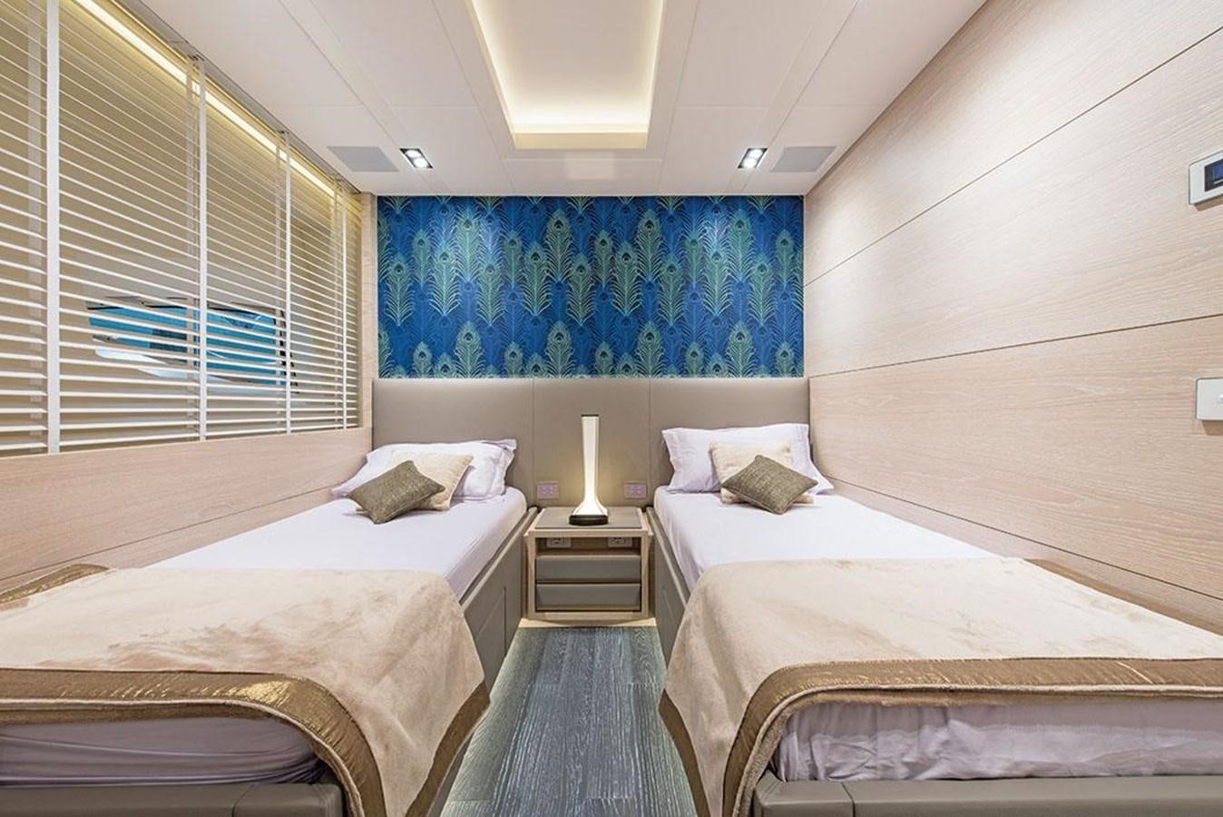 a couple of beds in a room aboard FAST & FURIOUS Yacht for Sale