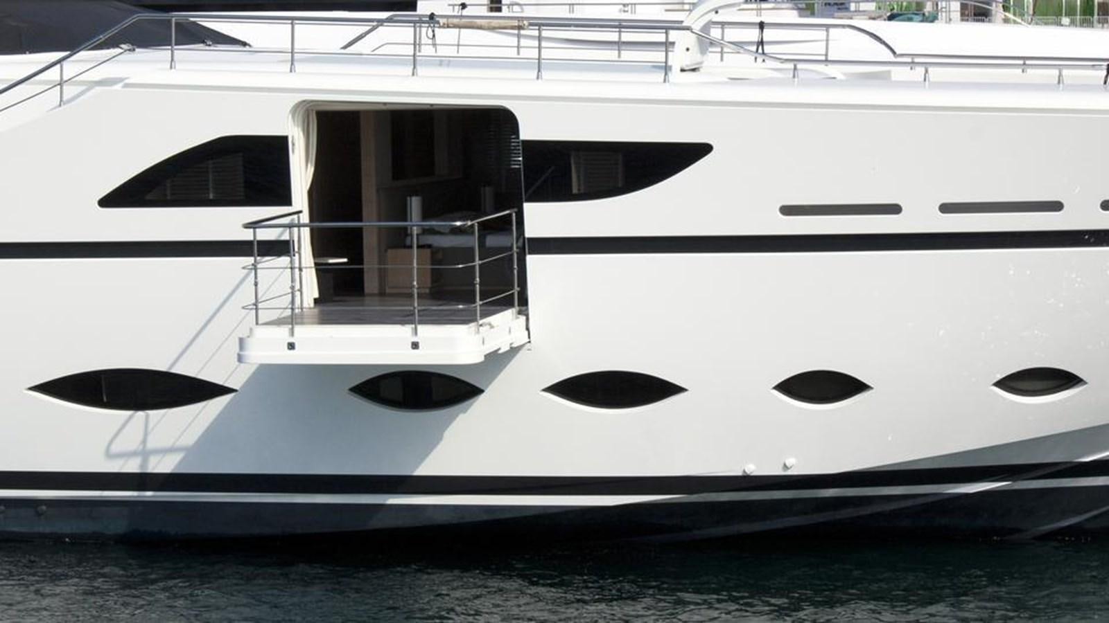 a white yacht on the water aboard FAST & FURIOUS Yacht for Sale
