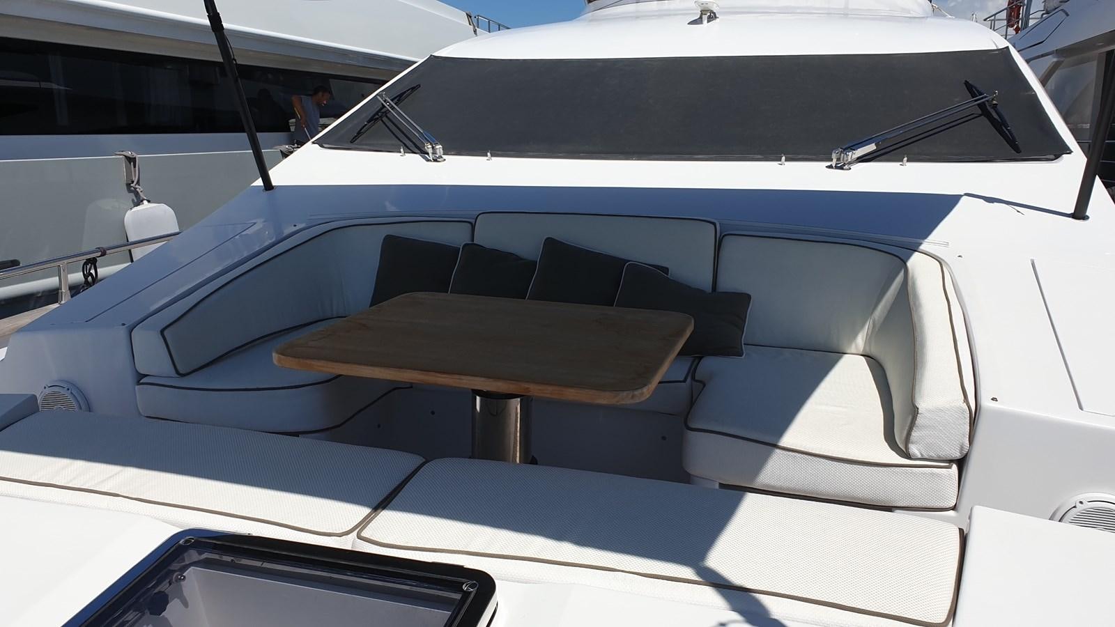 a white yacht with a wooden deck aboard VISIONARIA Yacht for Sale