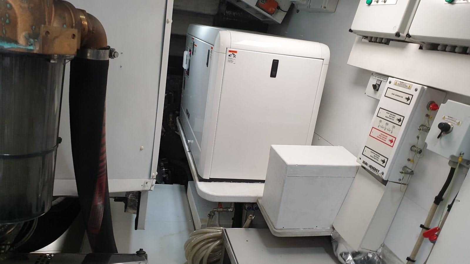 a machine with a large metal cylinder aboard VISIONARIA Yacht for Sale