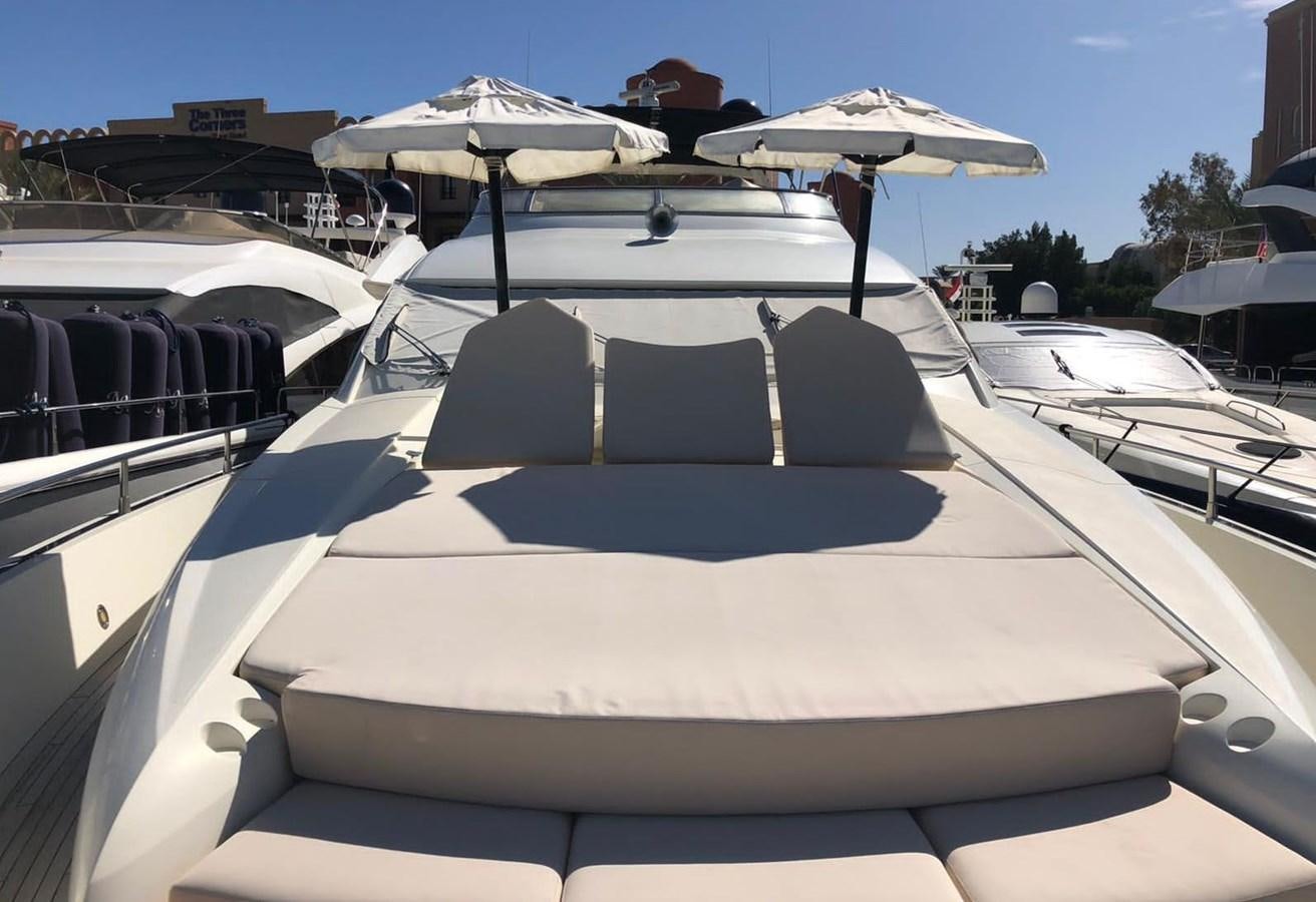 a pool with umbrellas aboard MI ALMA Yacht for Sale