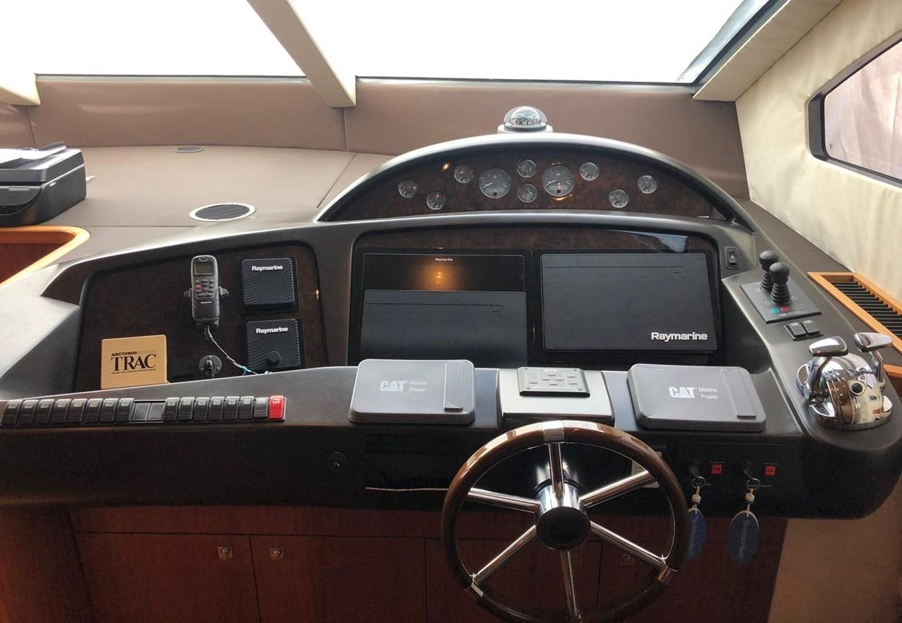 a black and silver console aboard MI ALMA Yacht for Sale