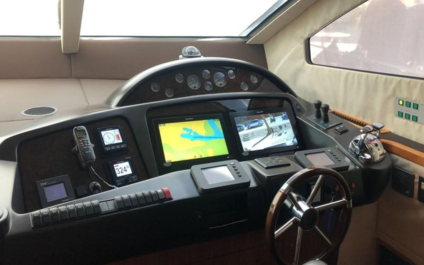 a car with a screen and buttons aboard MI ALMA Yacht for Sale