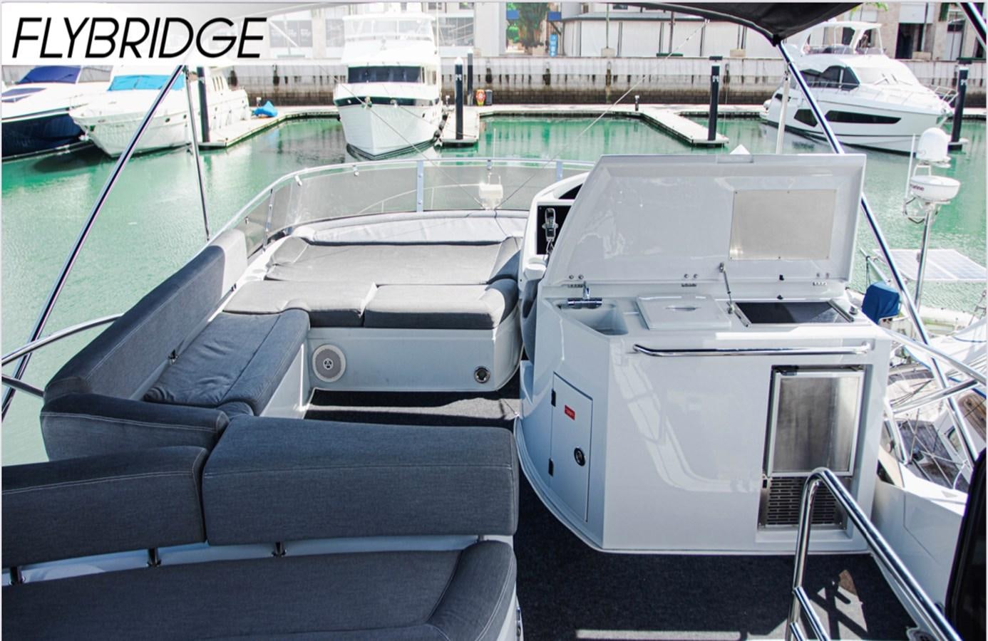 a boat parked in a harbor aboard FARA Yacht for Sale