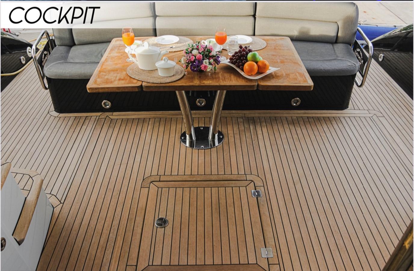 a table with a tray of food on it aboard FARA Yacht for Sale