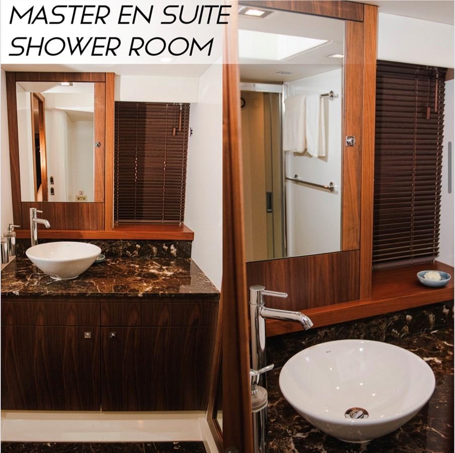 a bathroom with two sinks aboard FARA Yacht for Sale