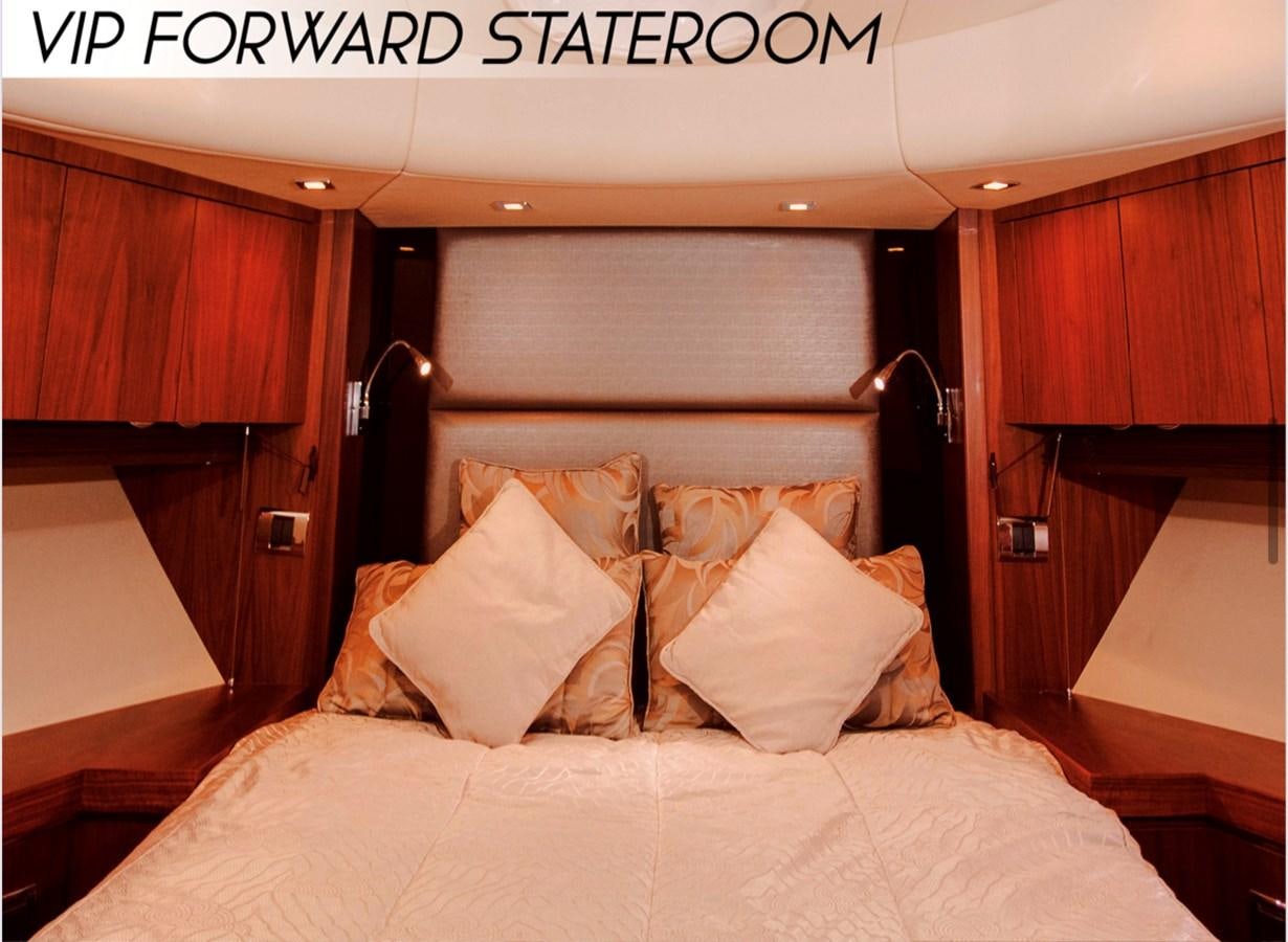 a bed with pillows aboard FARA Yacht for Sale