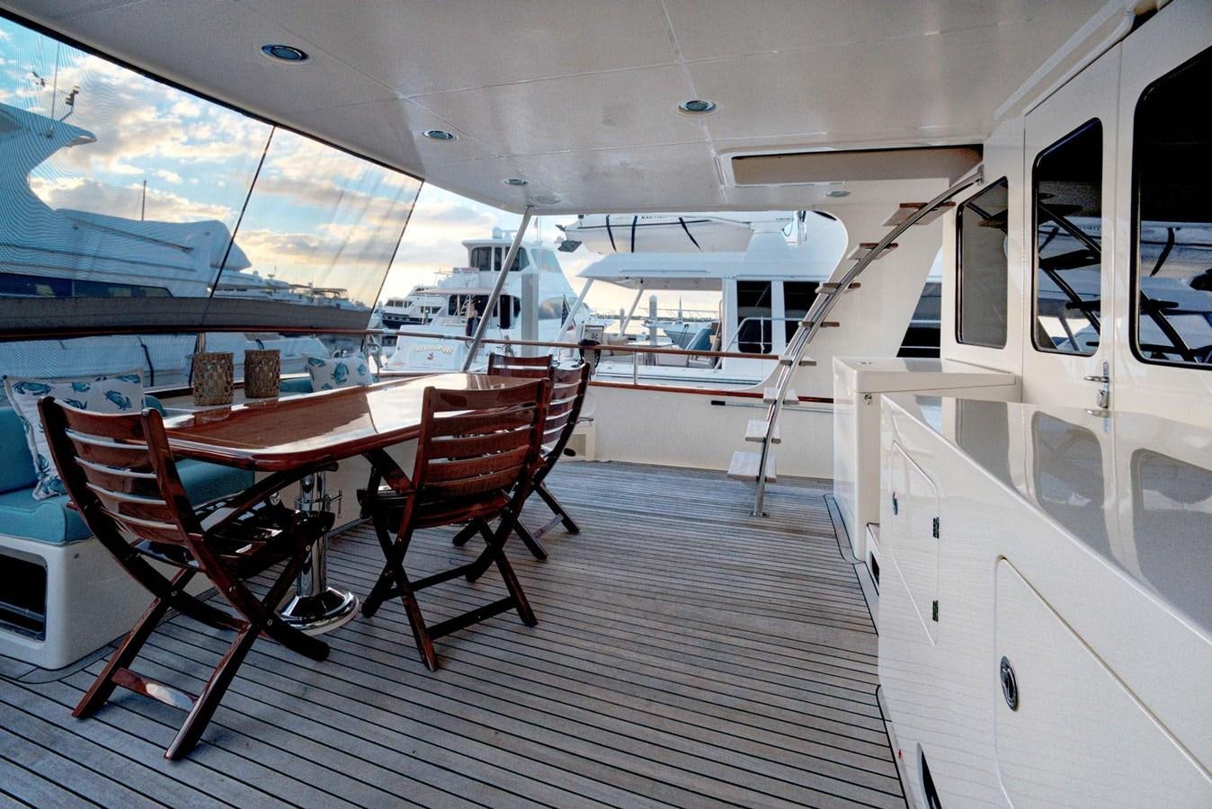 a boat with a table and chairs aboard BEACH TO BEACH Yacht for Sale