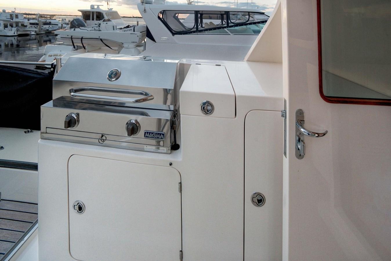 a silver suitcase on a boat aboard BEACH TO BEACH Yacht for Sale