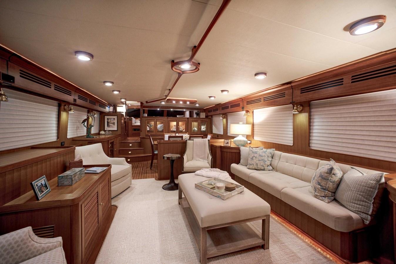 a living room with a couch and a coffee table aboard BEACH TO BEACH Yacht for Sale