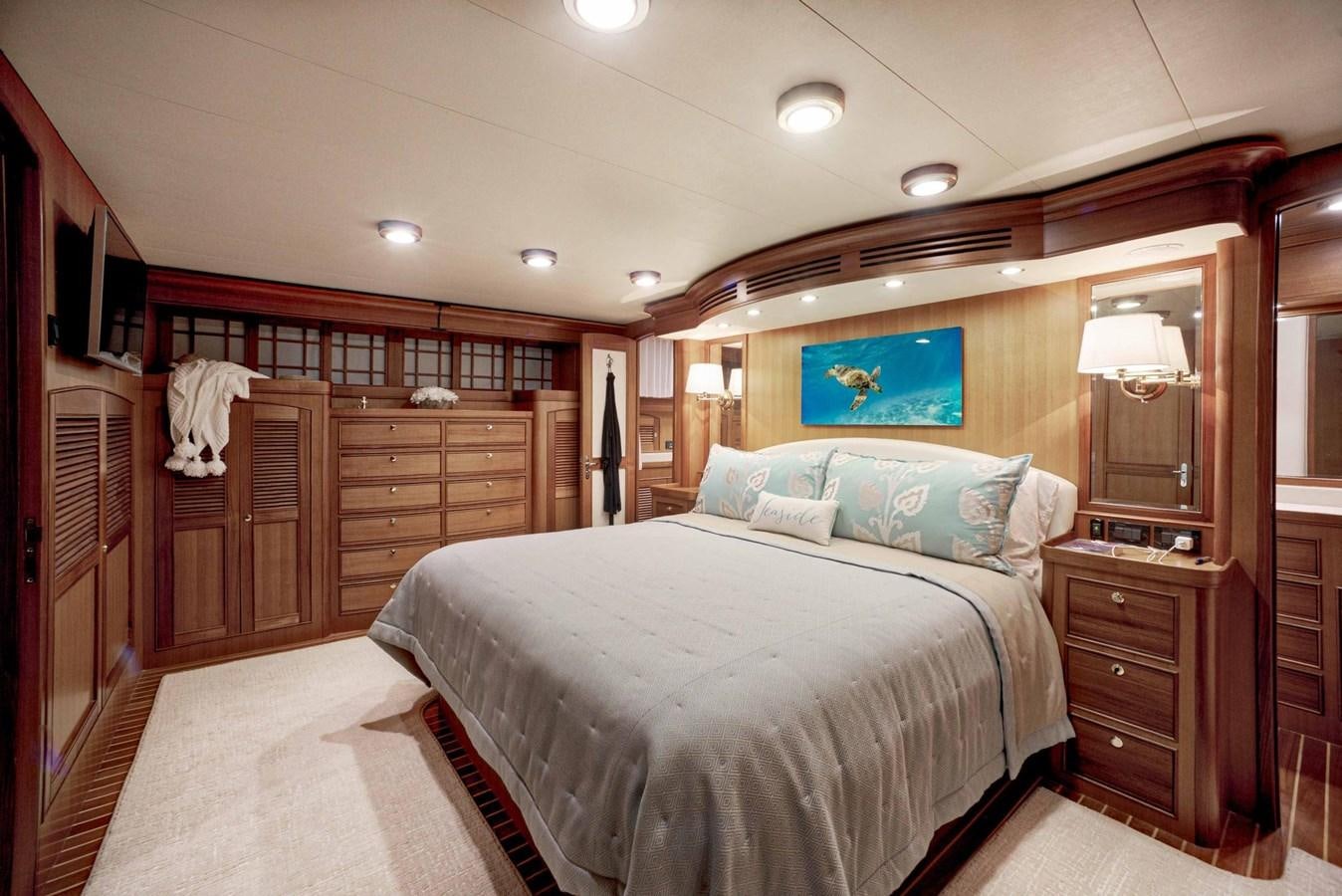 a bedroom with a large bed aboard BEACH TO BEACH Yacht for Sale