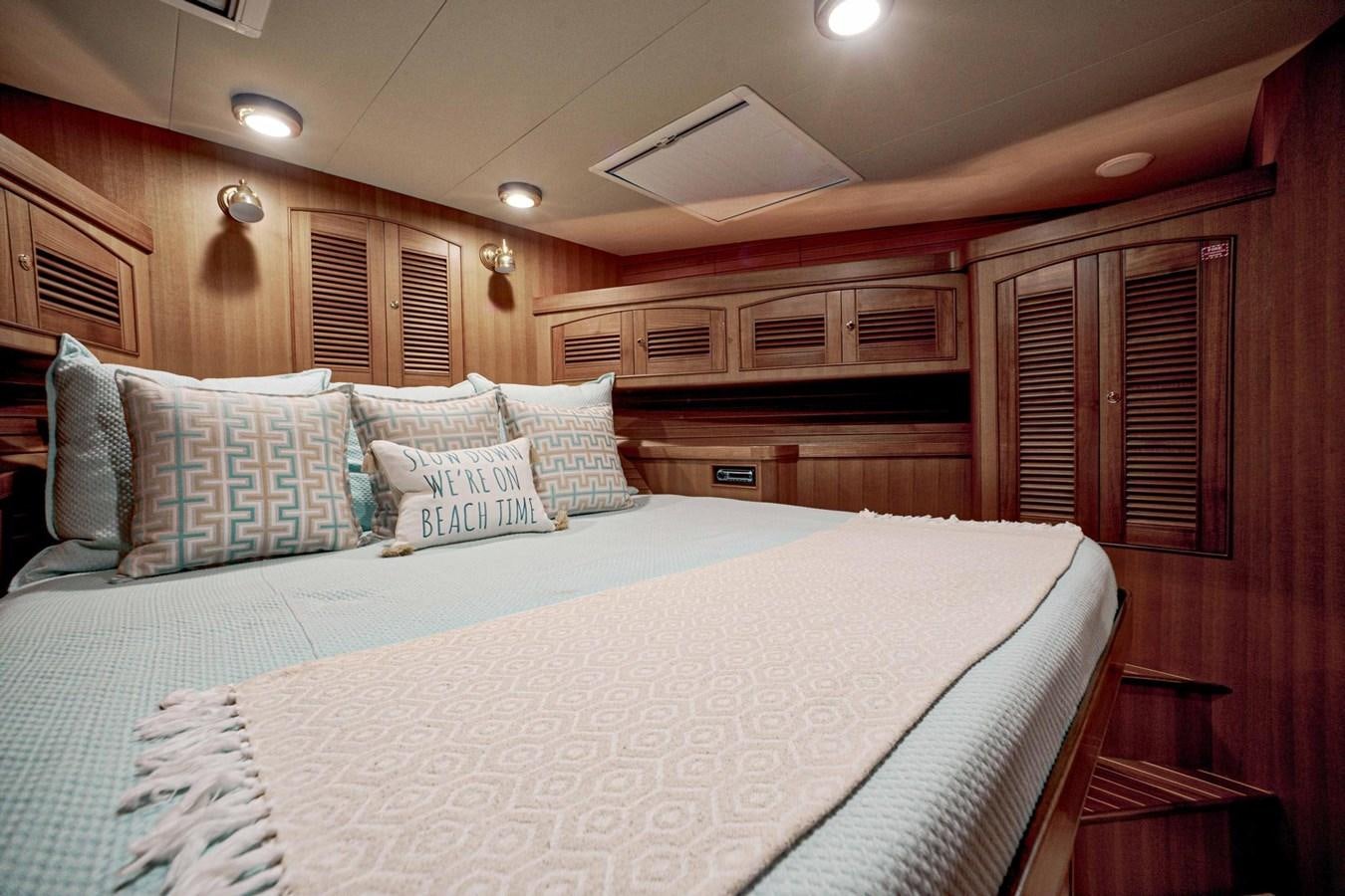 a large bed in a cabin aboard BEACH TO BEACH Yacht for Sale