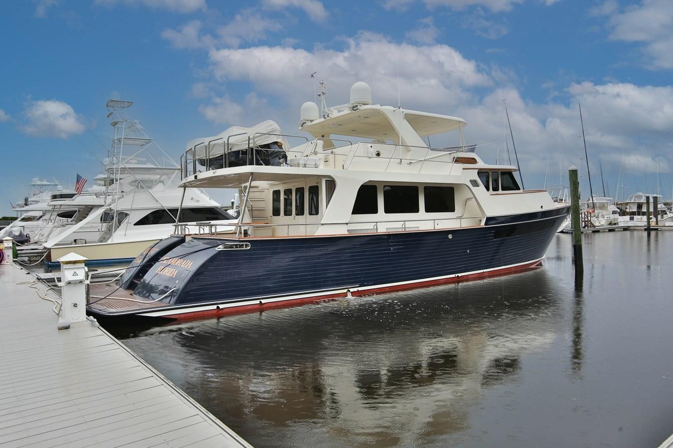 a boat docked at a dock aboard FREQUENT SEA Yacht for Sale