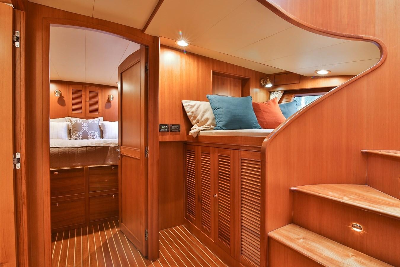a bed in a room aboard FREQUENT SEA Yacht for Sale