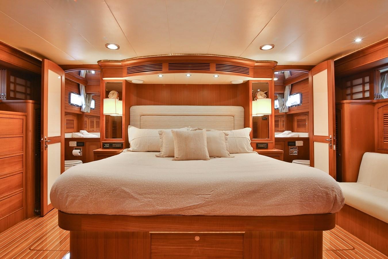 a bed in a room aboard FREQUENT SEA Yacht for Sale