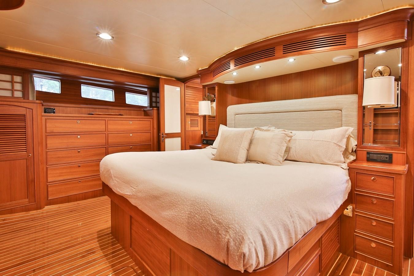 a bed in a room aboard FREQUENT SEA Yacht for Sale