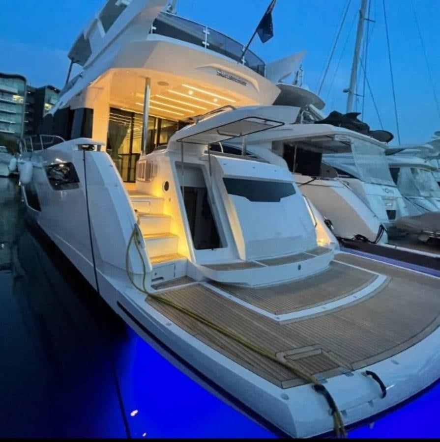 a close-up of a white yacht aboard CANDY Yacht for Sale