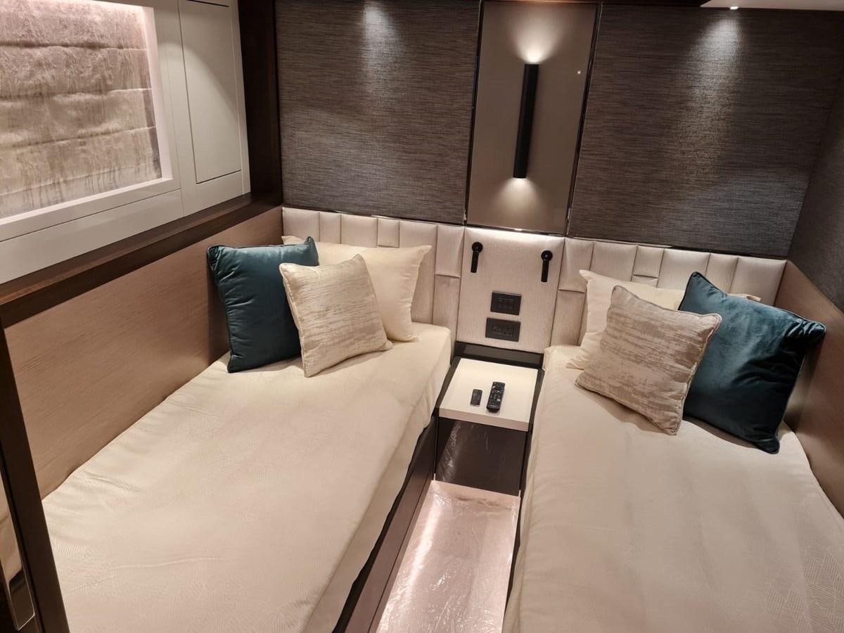 a room with a bed and a sink aboard CANDY Yacht for Sale