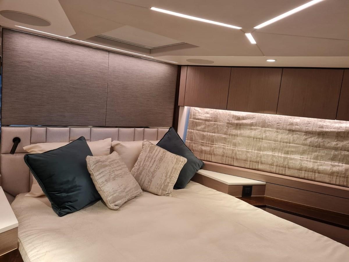 a bed with pillows aboard CANDY Yacht for Sale