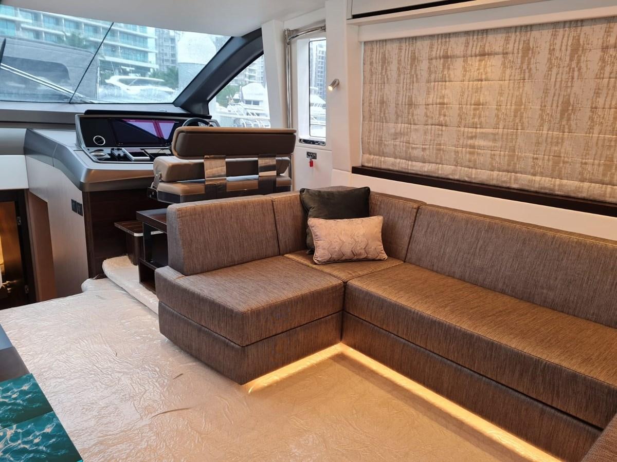 a couch in a living room aboard CANDY Yacht for Sale