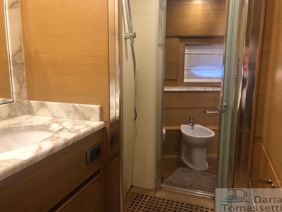 a bathroom with a sink and a toilet aboard FB Yacht for Sale