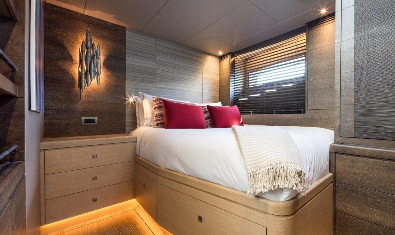 a bed in a room aboard ALICE Yacht for Sale