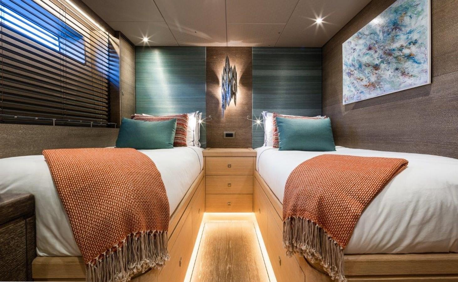 a room with two beds aboard ALICE Yacht for Sale