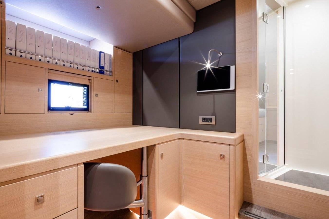 a room with a desk and a chair aboard ALICE Yacht for Sale