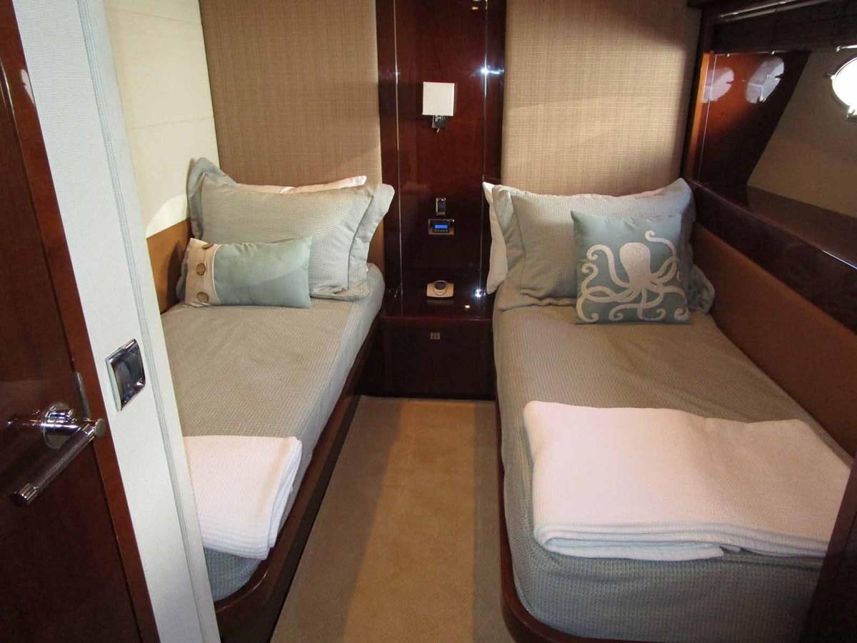 a hotel room with a bed aboard MOJO II Yacht for Sale