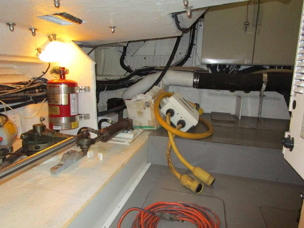 a machine with a large metal object on the top aboard MOJO II Yacht for Sale