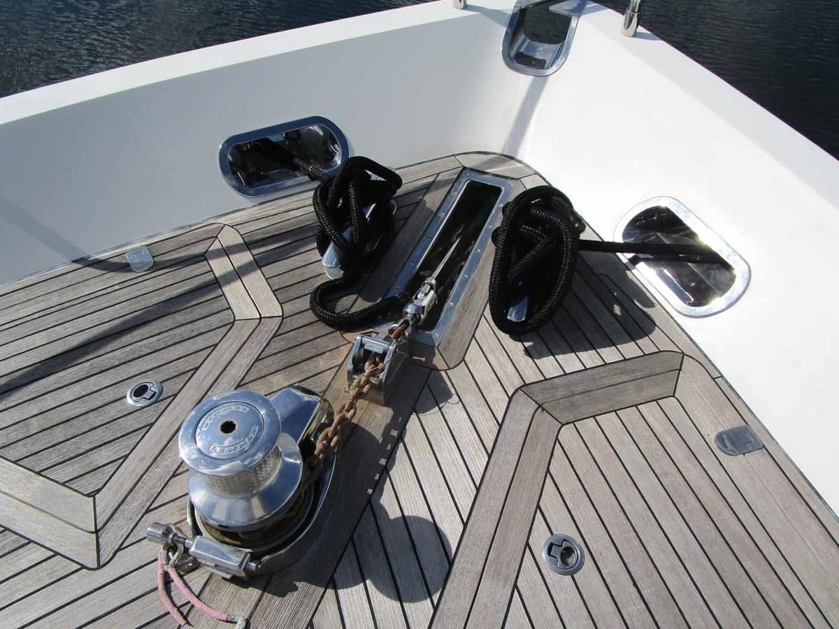 a set of headphones on a table aboard MOJO II Yacht for Sale