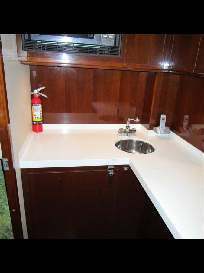 a sink with a faucet aboard MOJO II Yacht for Sale