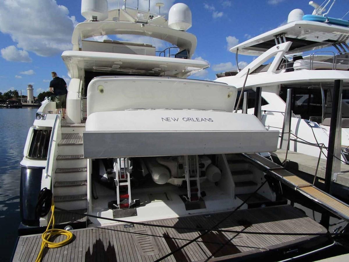 a boat on a deck aboard MOJO II Yacht for Sale