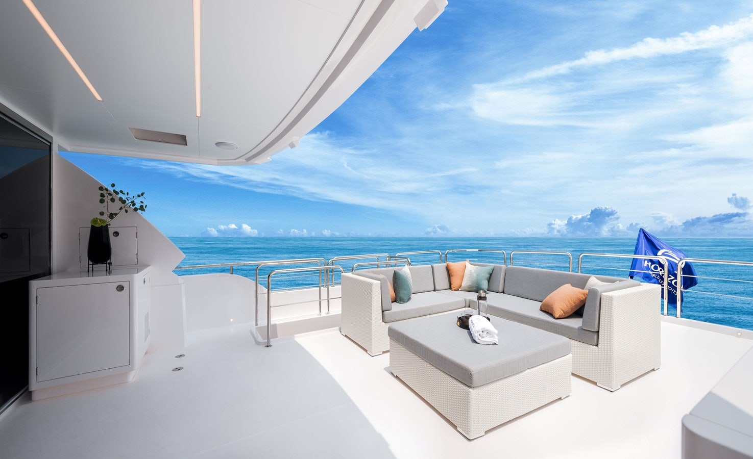 a room with a view of the ocean and a large white sofa aboard FD80 608 Yacht for Sale