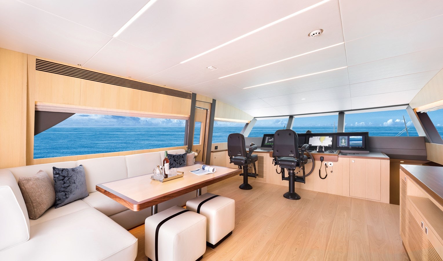 a room with a couch and a table and chairs aboard FD80 608 Yacht for Sale