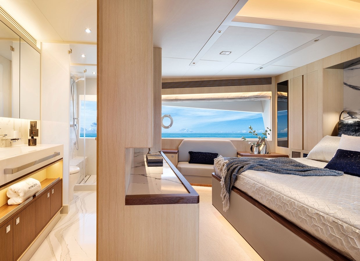 a room with a bed and a window aboard FD80 608 Yacht for Sale