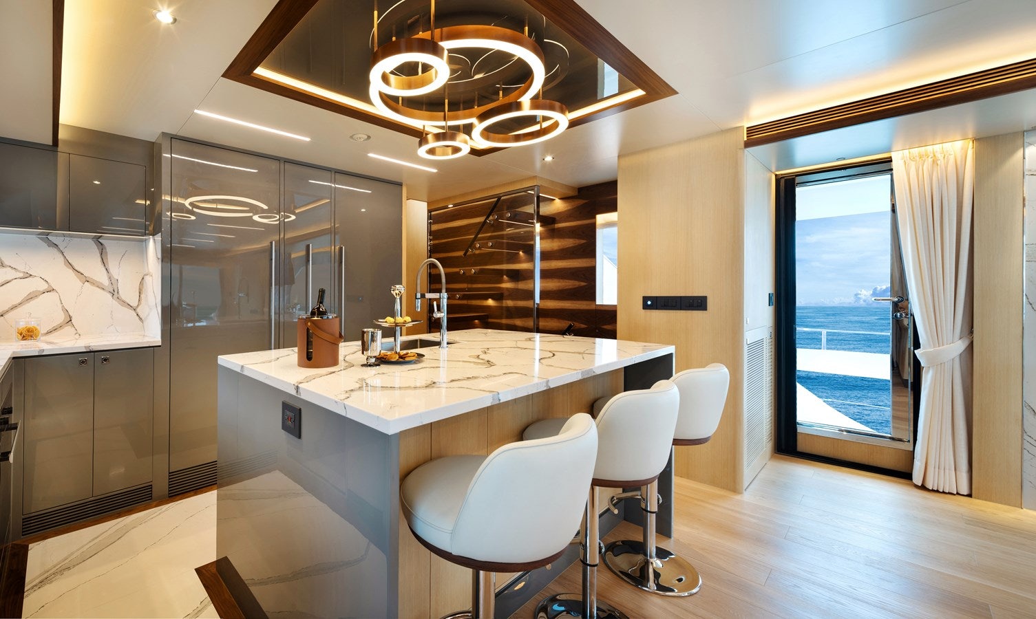 a kitchen with a large island aboard FD80 608 Yacht for Sale