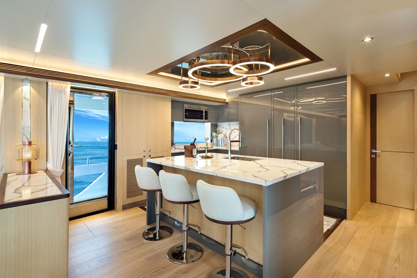 a room with a table and chairs aboard FD80 608 Yacht for Sale