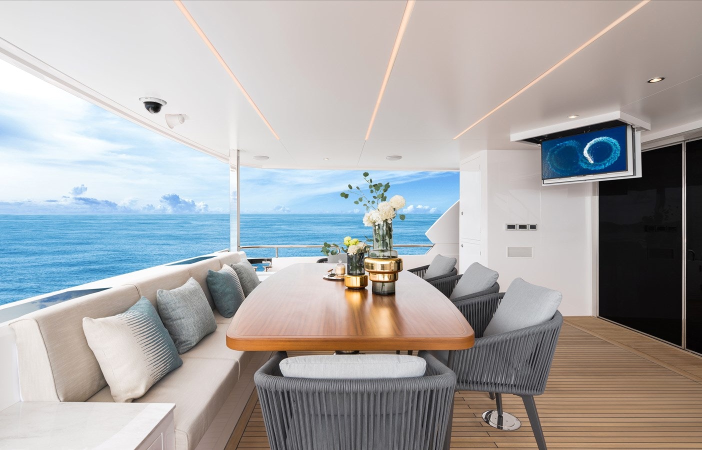 a living room with a table and chairs aboard FD80 608 Yacht for Sale
