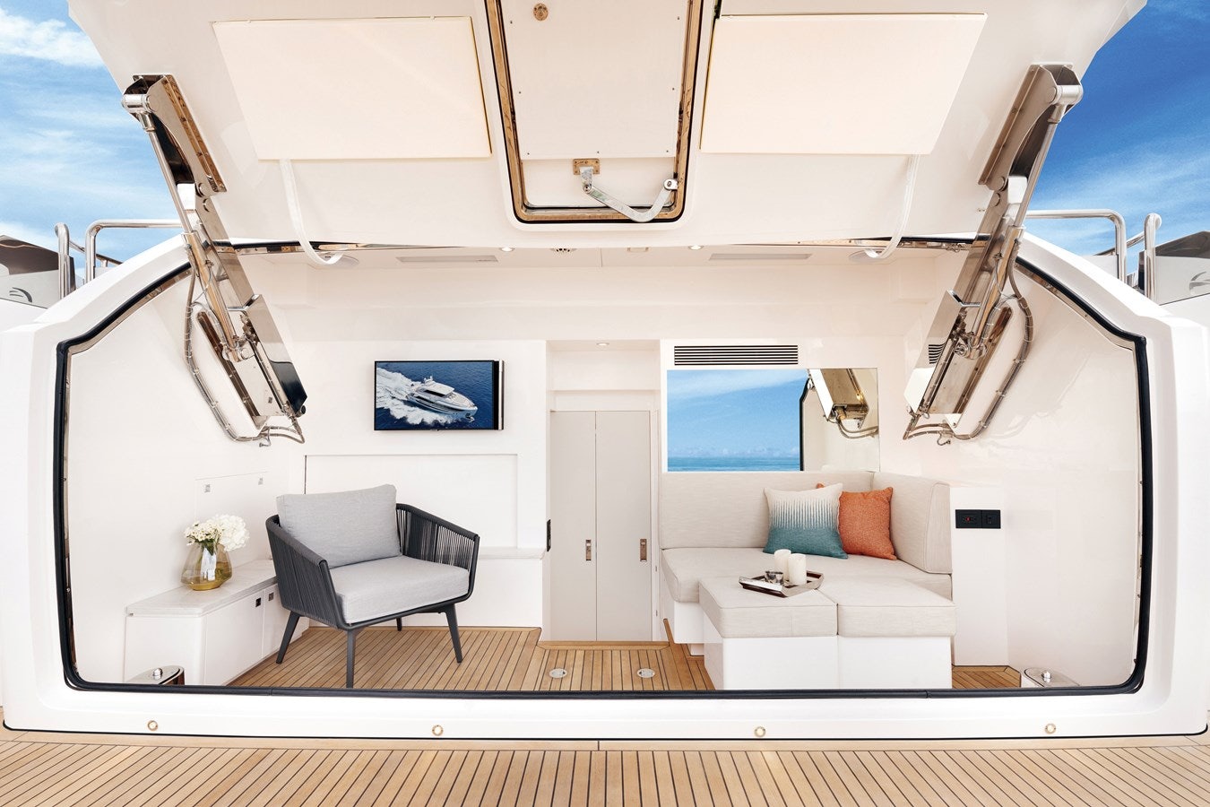 a white room with a chair and a couch aboard FD80 608 Yacht for Sale