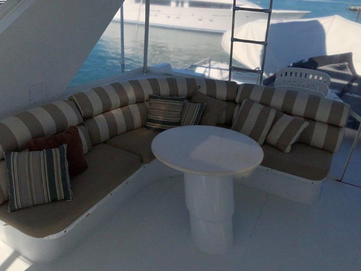 a white table on a boat aboard LADY GRACE Yacht for Sale