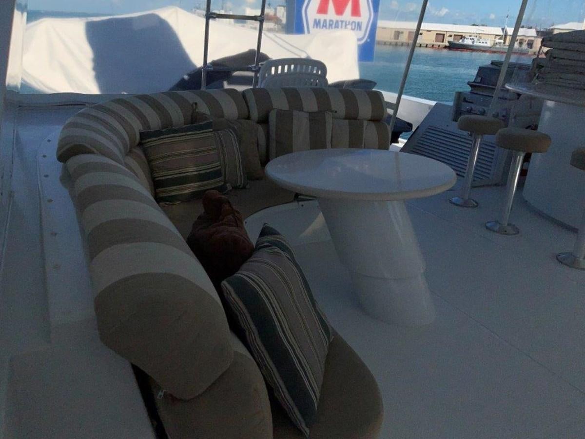 a person sleeping on a couch aboard LADY GRACE Yacht for Sale