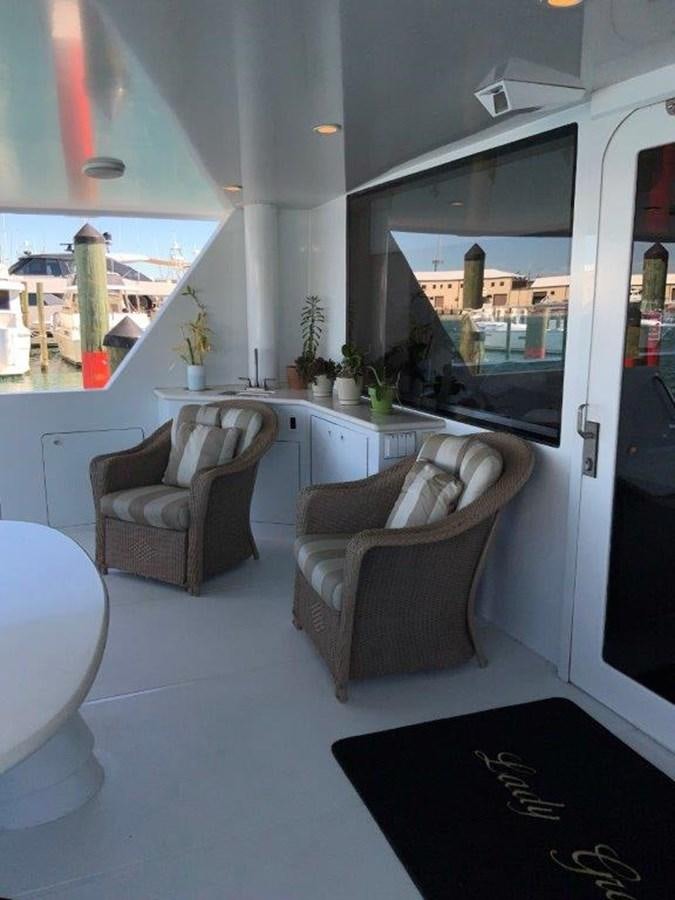 a room with a couch and a chair aboard LADY GRACE Yacht for Sale