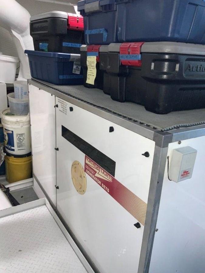 a white shelf with a sign on it aboard LADY GRACE Yacht for Sale
