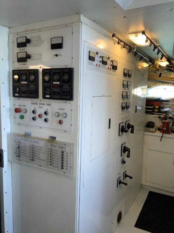 a white electrical cabinet aboard LADY GRACE Yacht for Sale