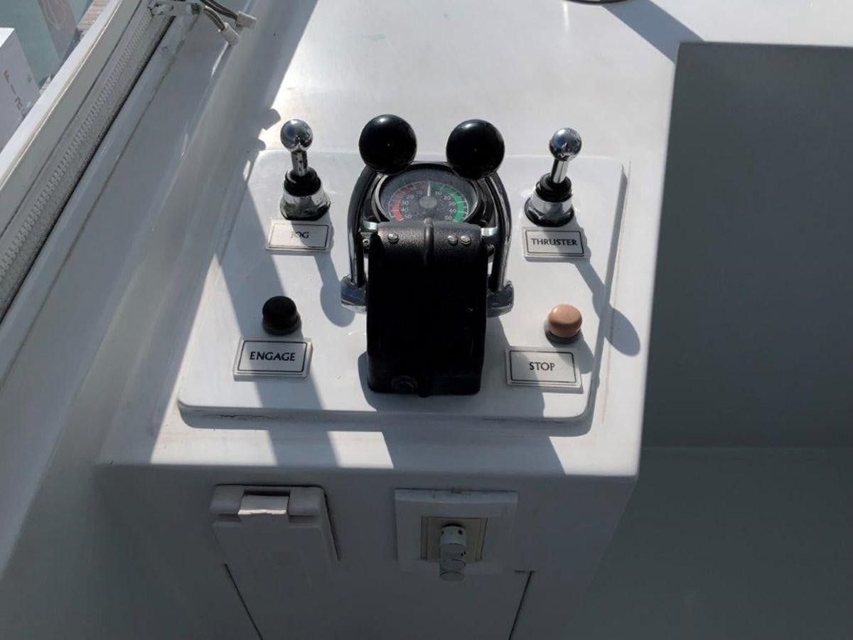 a black and silver faucet on a white shelf aboard LADY GRACE Yacht for Sale