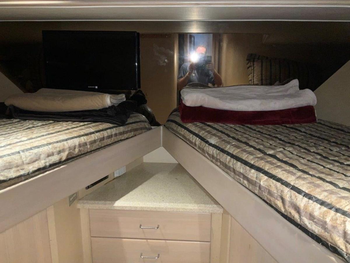 a couple of beds in a room aboard LADY GRACE Yacht for Sale