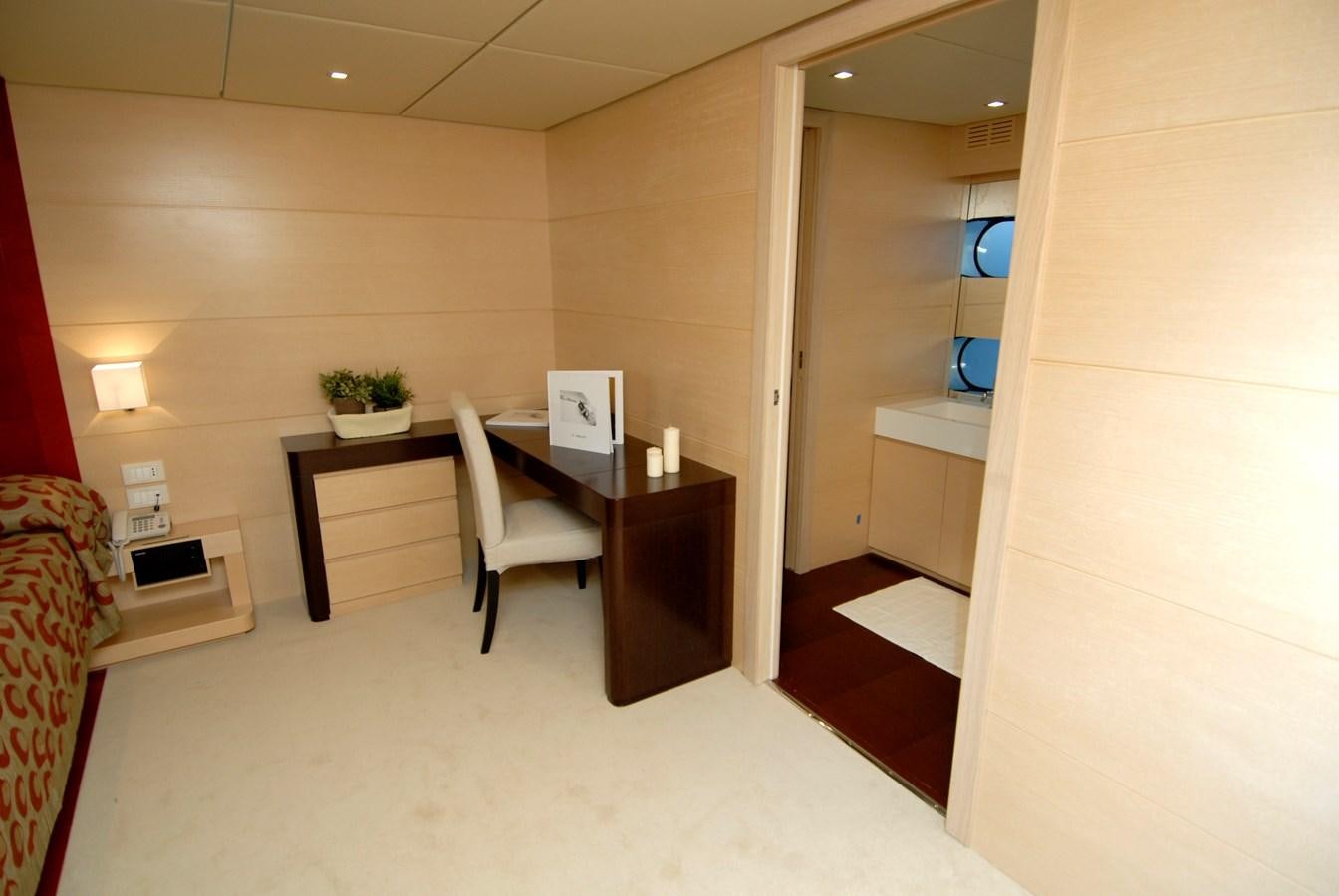 a room with a desk and a chair aboard MR. GU Yacht for Sale