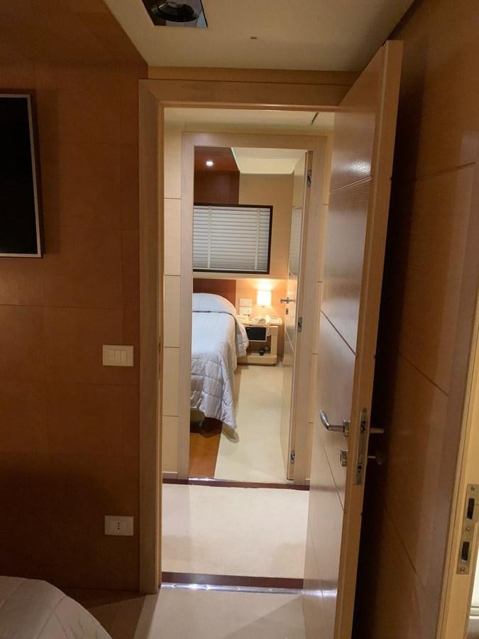 a bathroom with a large mirror aboard MR. GU Yacht for Sale
